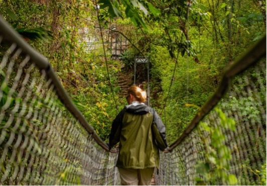 Alissia Lingaur, an adjunct instructor with Northwestern Michigan College’s Communications Department, leading students through Reserva Natural Atitlan, Guatamala, in 2023